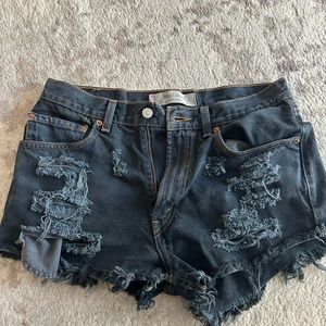 Black Levi’s Jean Shorts.  Fits like a size Small/Medium, Size 6, or size 27